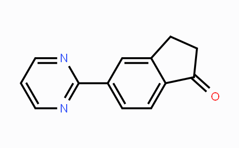 CAS No. 1334784-74-5, 5-Pyrimidin-2-yl-indan-1-one